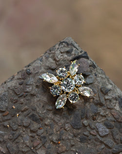 Designer flower shaped metal button in swarovski crystal
