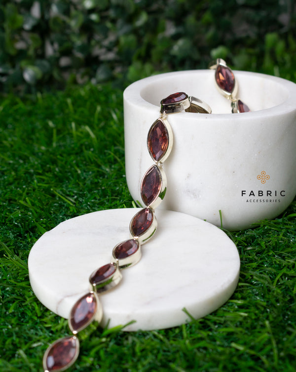 Water Gold Plated Leaf shaped Maroon stones Plastic base Chain